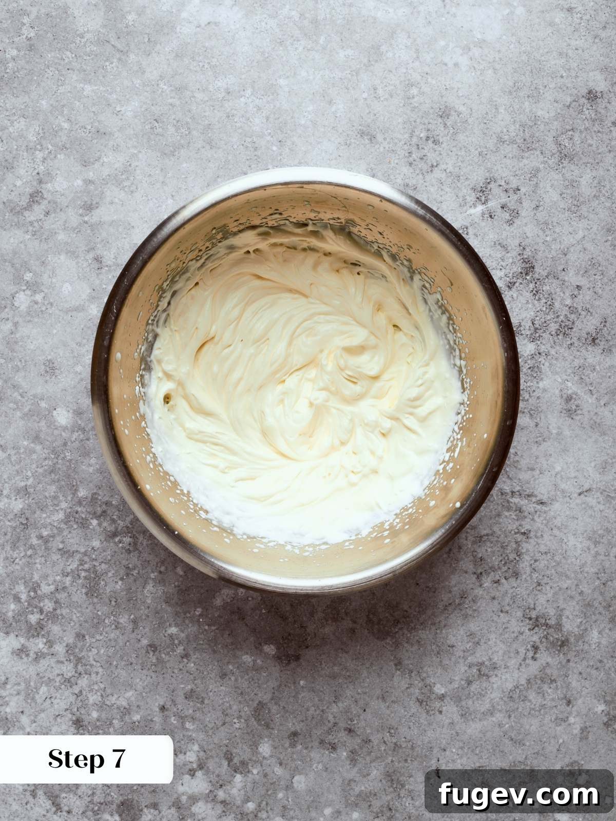 Sweet Cream Clouds 27 Crème légère whipped cream in silver bowl, light and airy texture.
