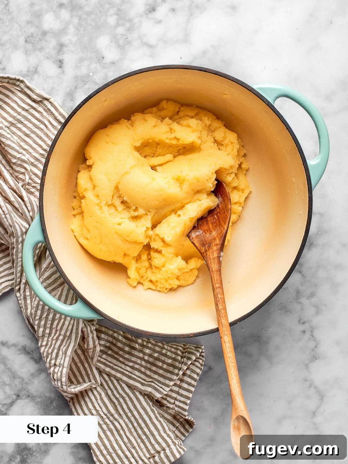 Golden Savory Puffs 11 Choux dough cooking in pot pulling away from sides forming smooth cohesive mass. The panade reaching the ideal consistency for choux pastry.