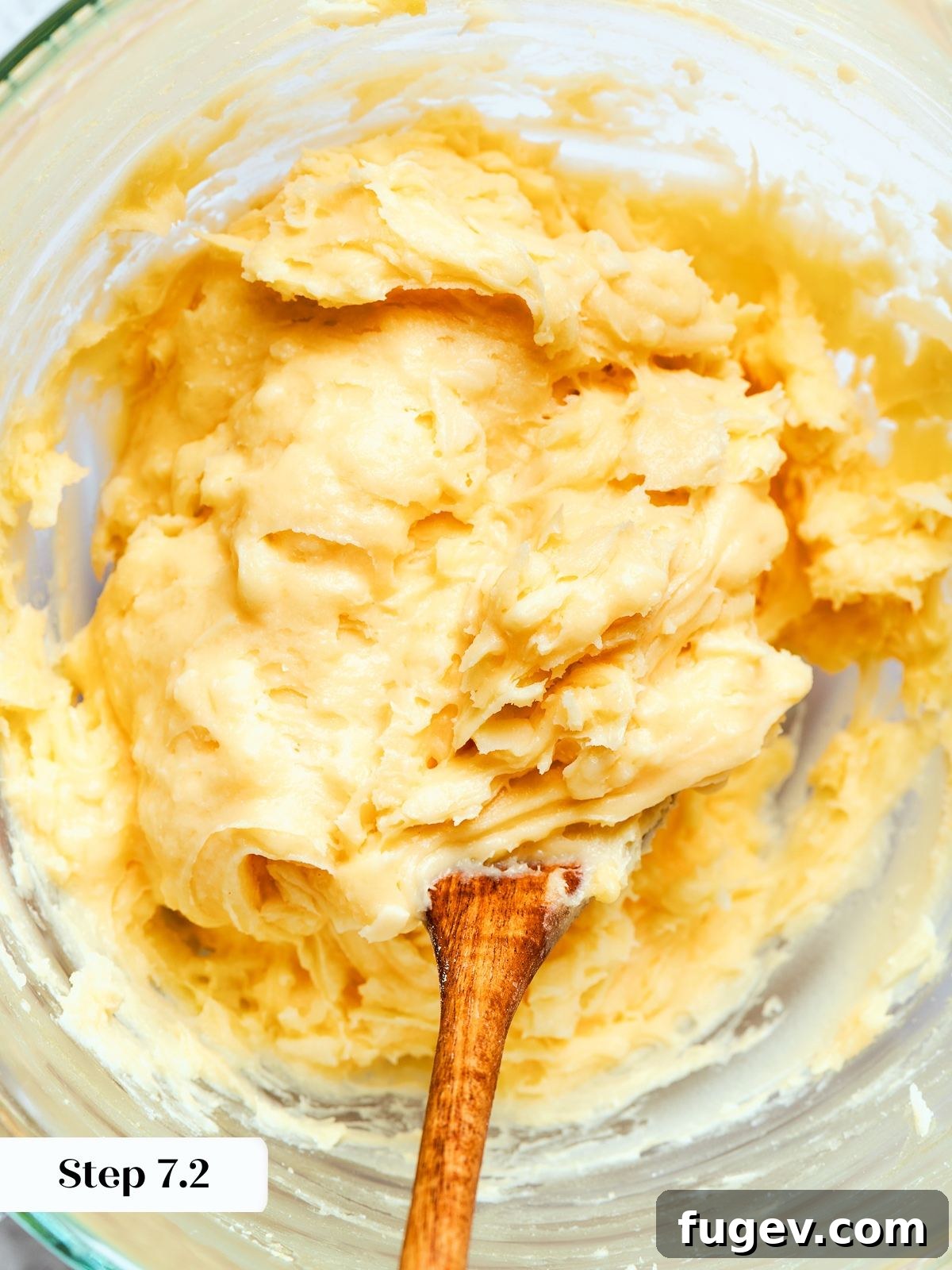 Golden Savory Puffs 16 Choux dough mixed with shredded cheese evenly distributed throughout thick batter. A close-up of the ready-to-pipe choux pastry.