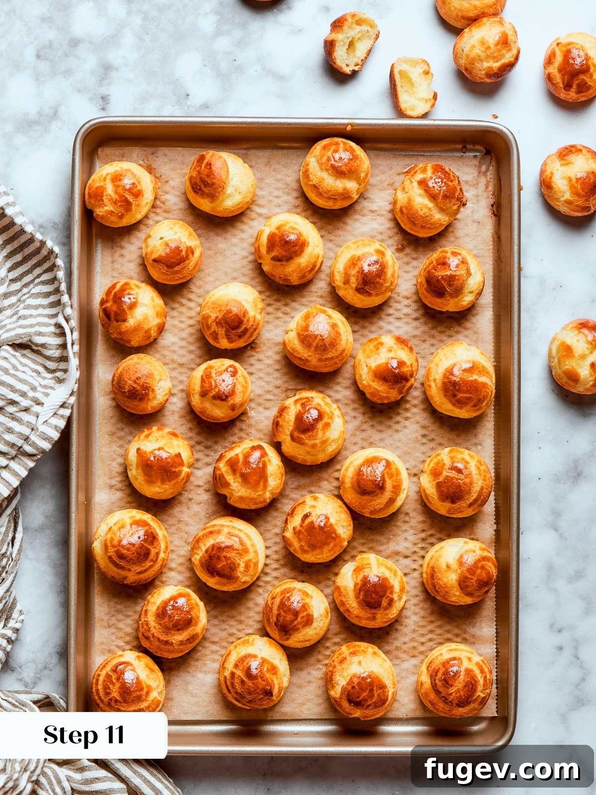 Golden Savory Puffs 20 baked choux pastry. A tray of golden, perfectly puffed Gougères fresh from the oven.