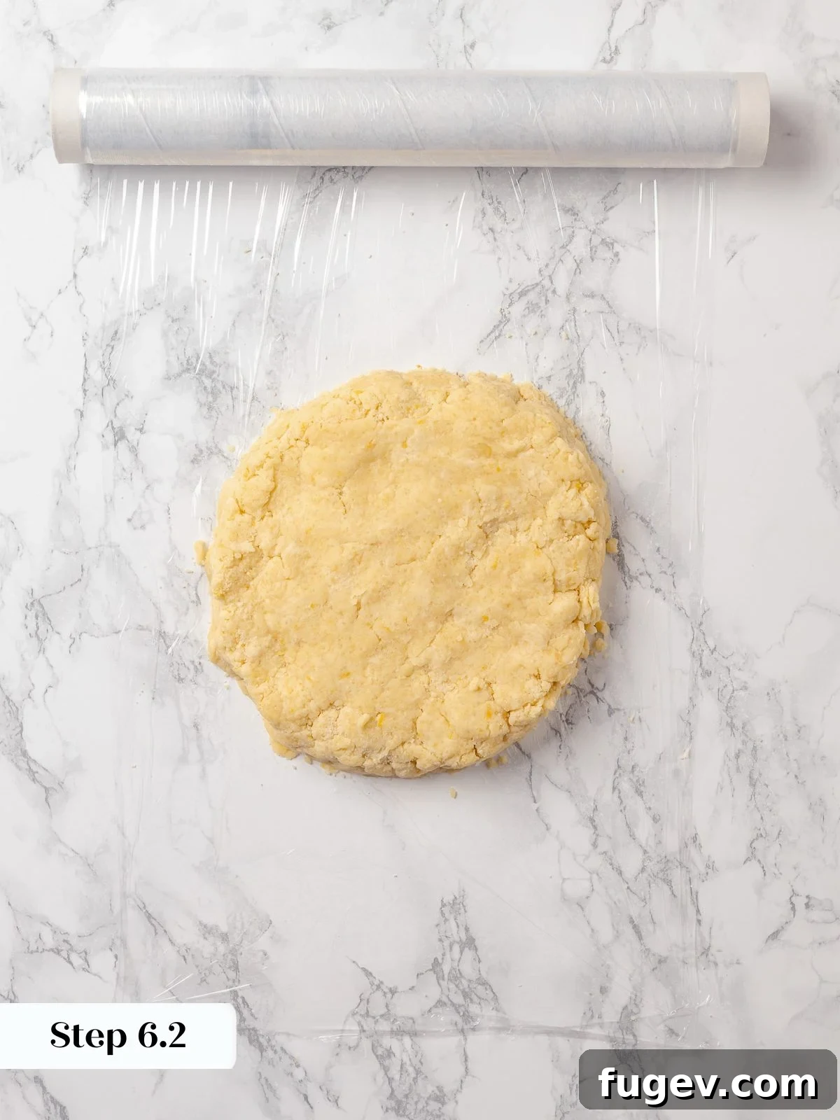 Sun-Kissed Lemon Scones 14 Scone dough pressed into a flat, even disk before chilling, allowing it to develop proper structure and flavor.