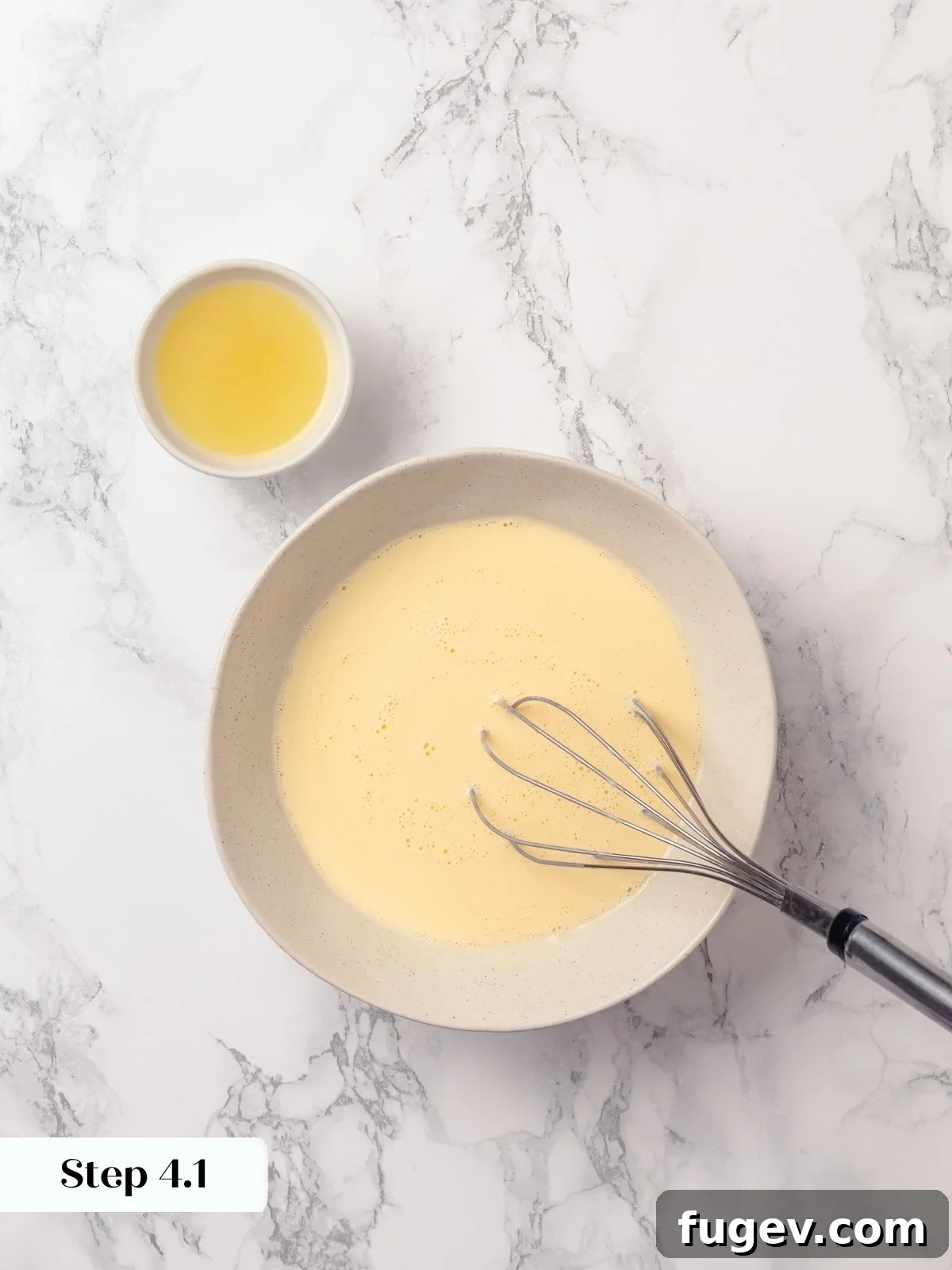 Sun-Kissed Lemon Scones 10 Eggs, heavy cream, and lemon juice whisked together until smooth, creating a homogeneous liquid mixture for the scone dough.