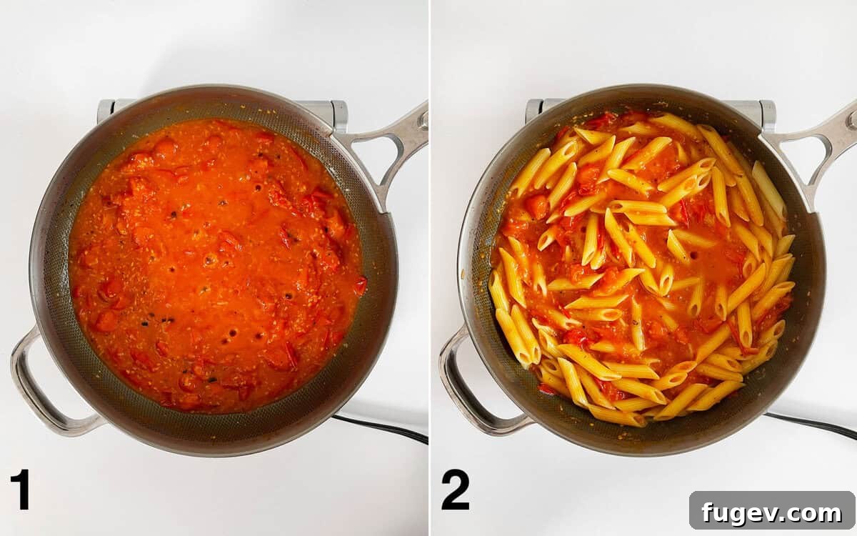 Tomato sauce simmering in a skillet. Pasta stirred into sauce.