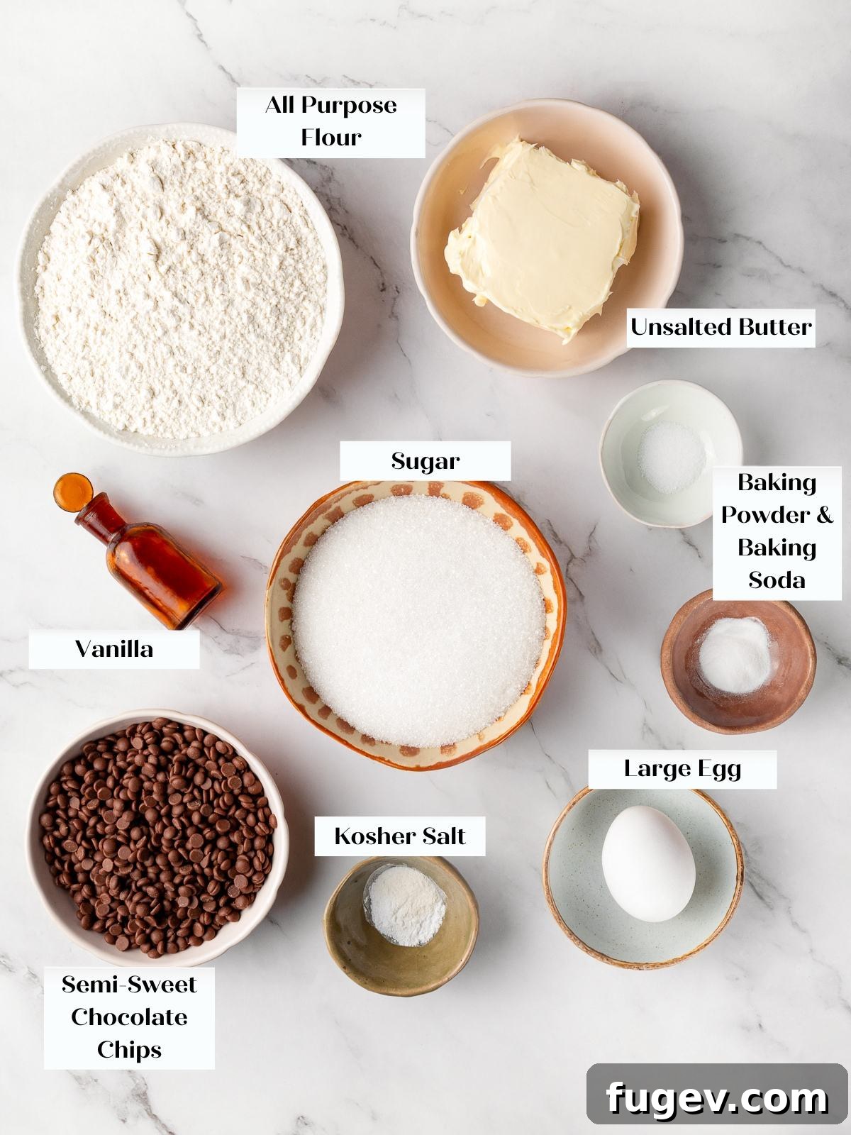 The ingredients for chocolate chip cookies without brown sugar arranged neatly on a kitchen counter.