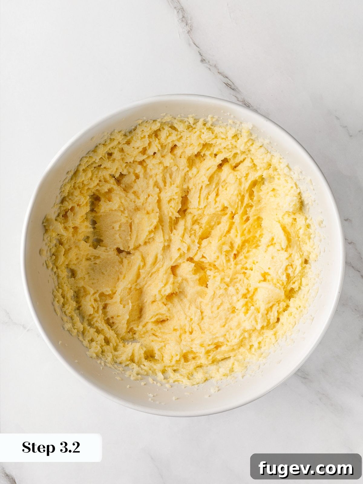 The cookie dough base after the egg and vanilla have been fully incorporated, looking smooth.