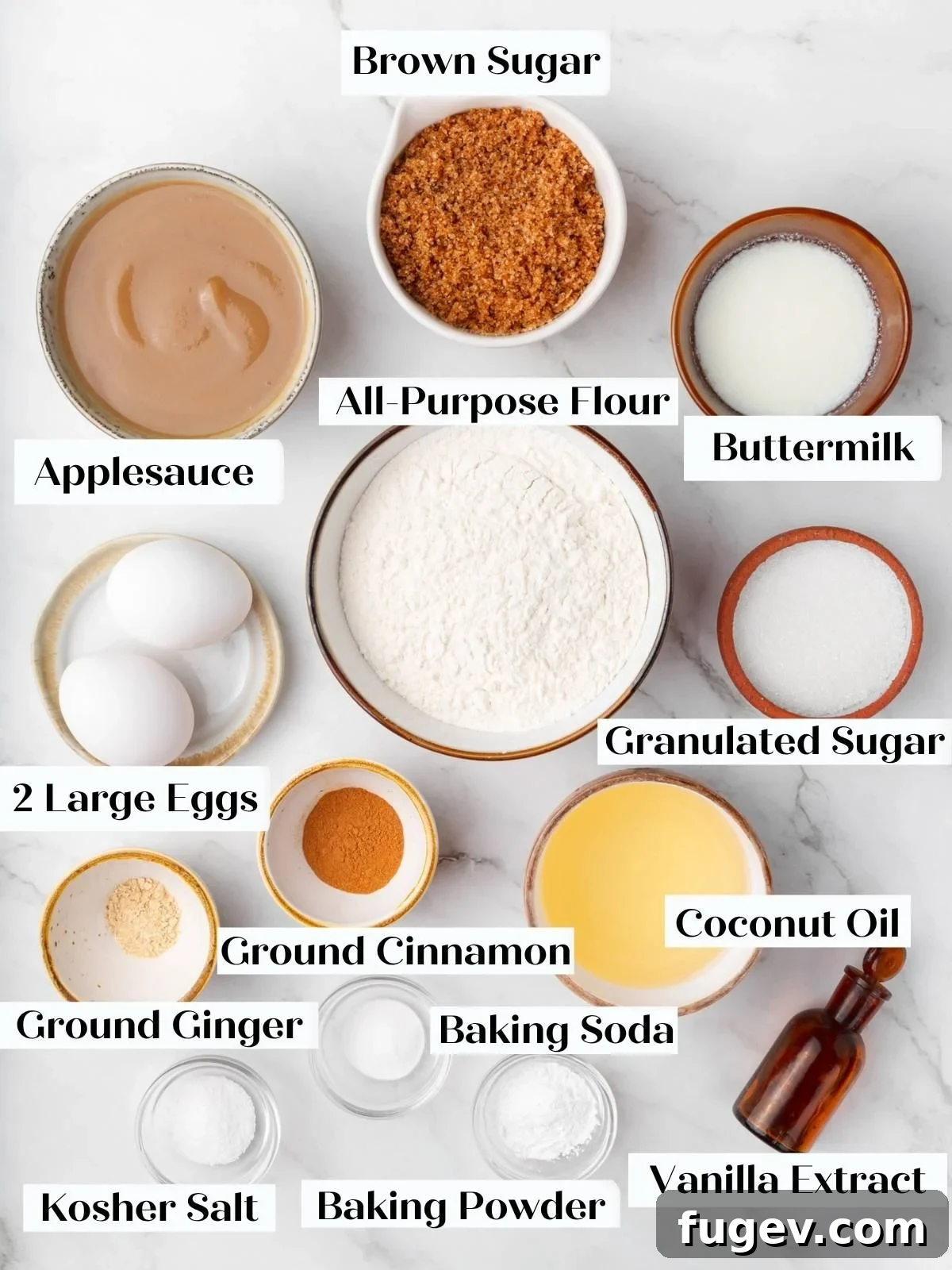 Labeled bowls of applesauce, brown sugar, buttermilk, flour, eggs, sugar, spices, coconut oil, and vanilla.