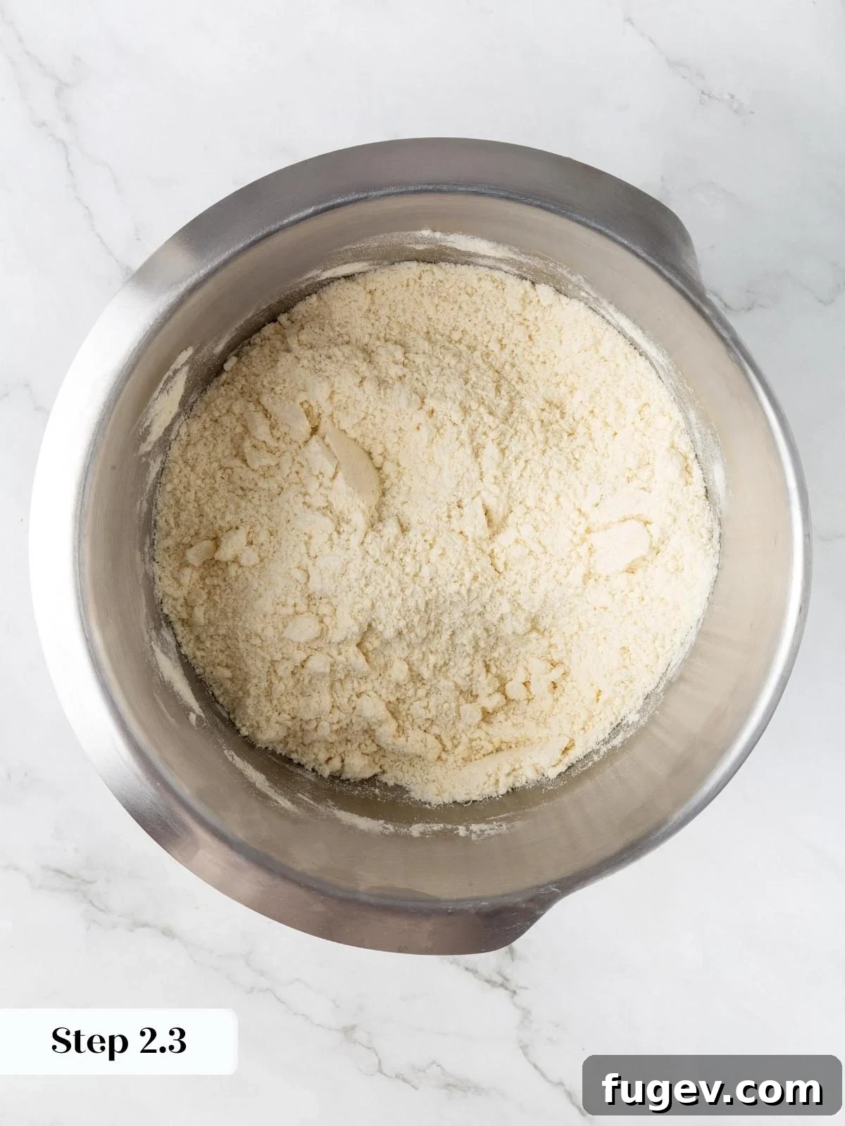 White Chocolate Raspberry Bliss Scones 8 The butter fully cut into the flour, resulting in a sandy, crumbly texture.