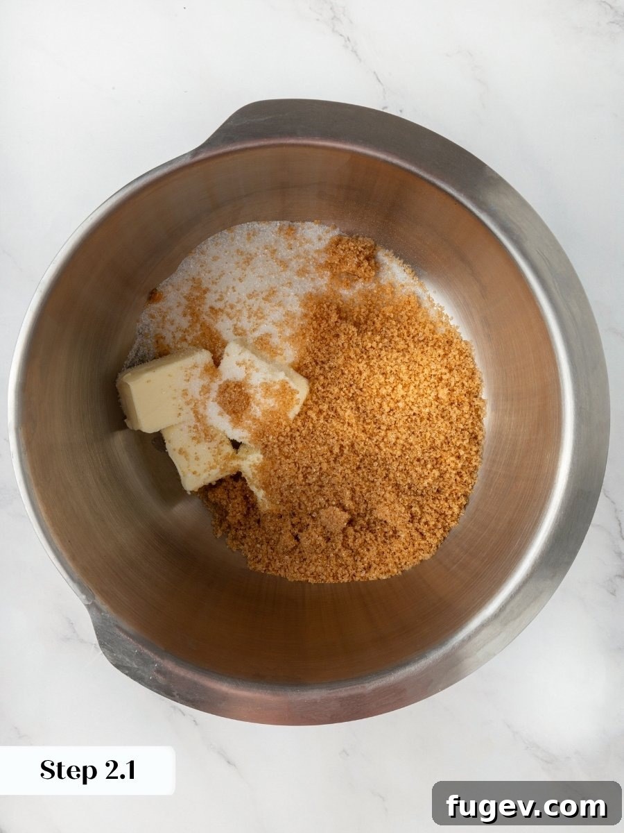 Butter and two sugars begin the almond flour chocolate chip cookies dough for a chewy result.
