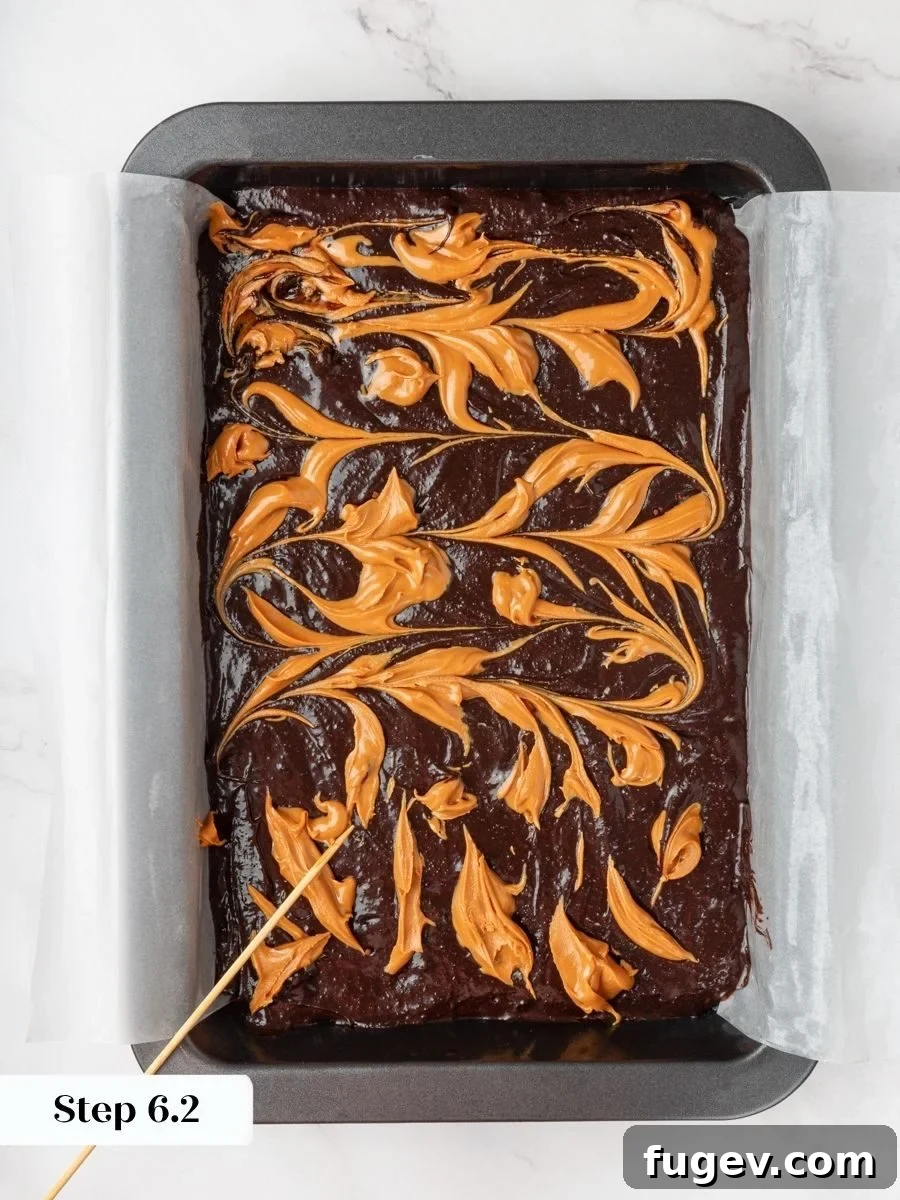 Fudgy Peanut Butter Brownies Recipe 11 Natural peanut butter ribbons through the batter, the signature swirl that defines these peanut butter brownies.