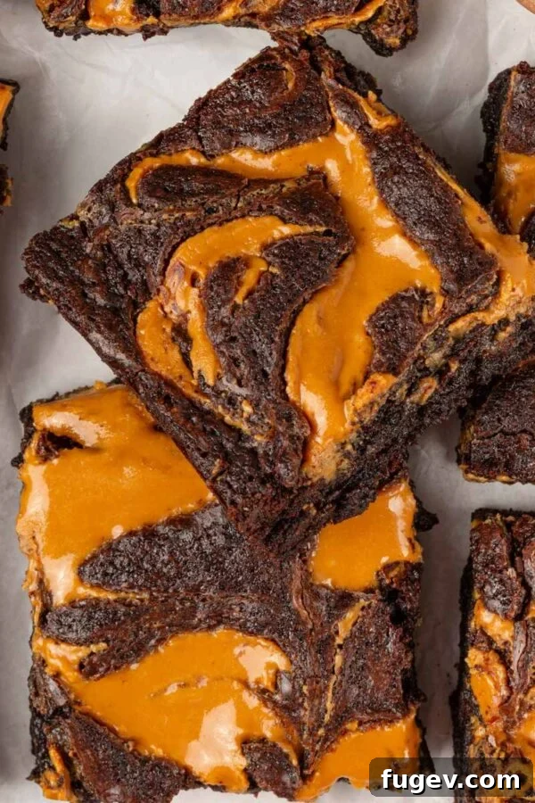 Fudgy Peanut Butter Brownies Recipe 15 A second featured option stacks the peanut butter brownies to show both swirl and soft interior.