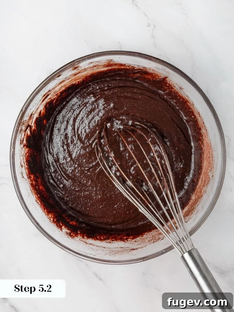 Fudgy Peanut Butter Brownies Recipe 9 Smooth, lump-free batter signals the peanut butter brownies are ready to spread and swirl before baking.