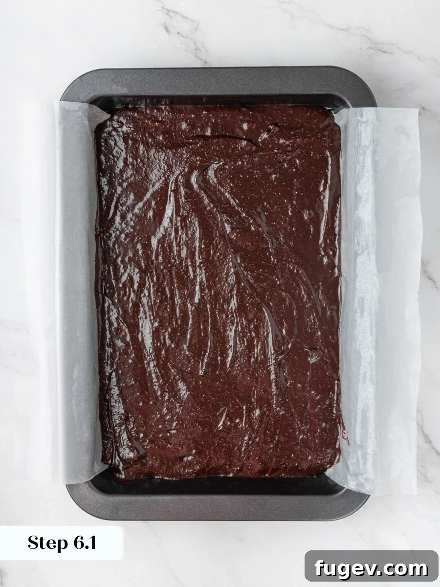 Fudgy Peanut Butter Brownies Recipe 10 An even layer gives the peanut butter brownies a flat base so the swirl reads clearly.