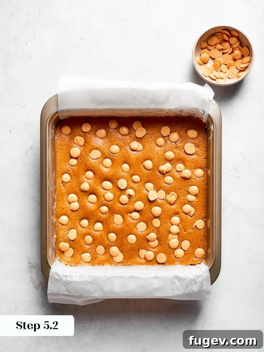 These pockets of melted peanut butter chips deepen the flavor in every peanut butter blondies square.