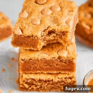 Framed square for the recipe card, these peanut butter blondies show off their signature chew.