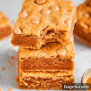 Framed square for the recipe card, these peanut butter blondies show off their signature chew.