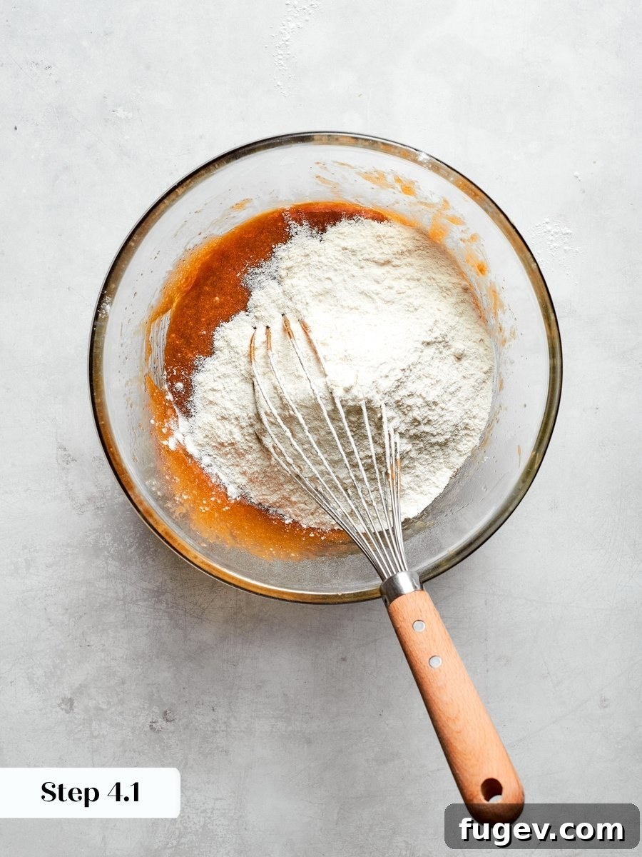 Adding the dry ingredients all at once keeps the peanut butter blondies batter tender, not tough.