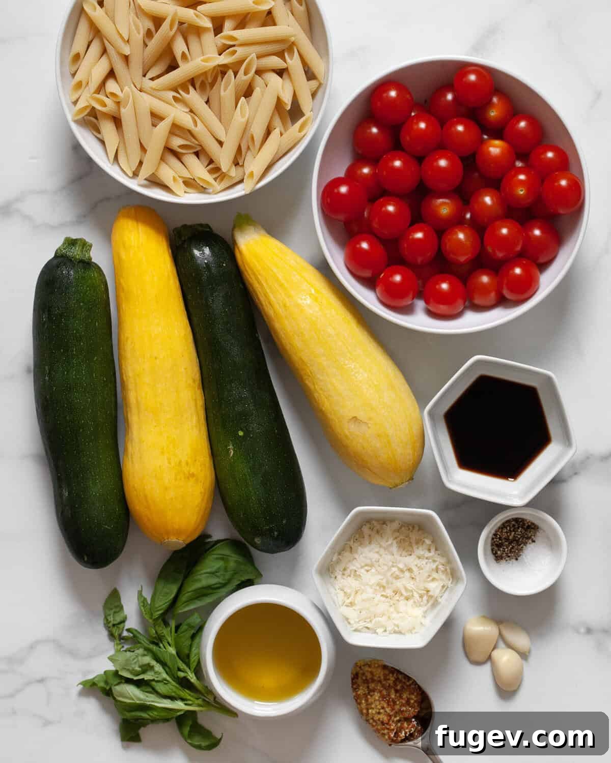 Ingredients including zucchini, squash, tomatoes, penne, garlic, olive oil, balsamic vinegar, parmesan, basil, mustard, salt and pepper.