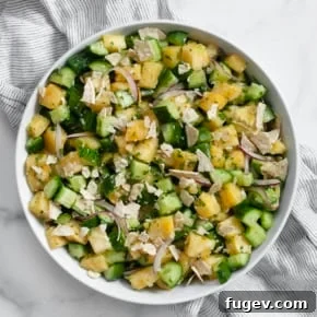 Pineapple cucumber salad in a bowl.