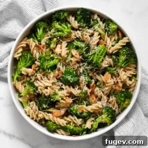 Roasted broccoli pasta salad in a bowl.