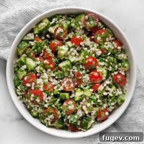Tabbouleh barley salad in a large bowl.
