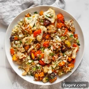 Roasted vegetable salad with sweet potatoes, cauliflower and sweet potatoes on a plate.