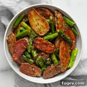 Roasted asparagus potato salad in a bowl.