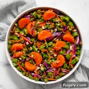 Snap pea citrus salad in a bowl.