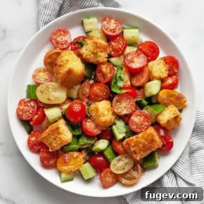 Cornbread panzanella salad on a plate.