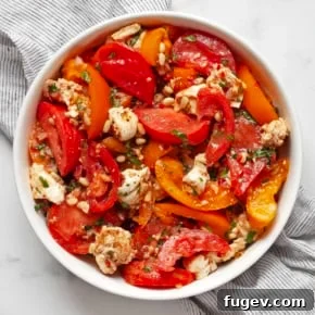 Heirloom tomato salad in a large bowl.