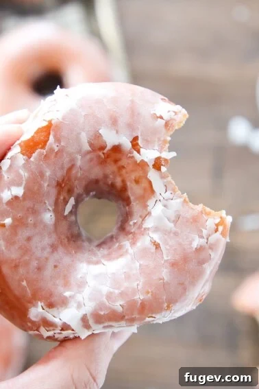 Krispy Kreme Copycat Donut in hand.