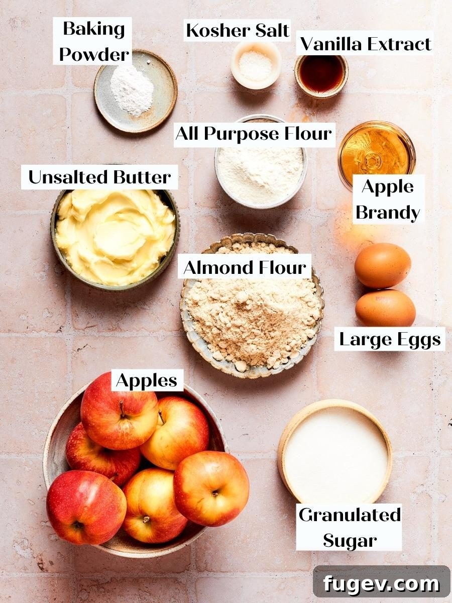 Classic French Apple Cake Recipe 4 Gathered ingredients for french apple cake show the almond flour and apples central to this recipe.
