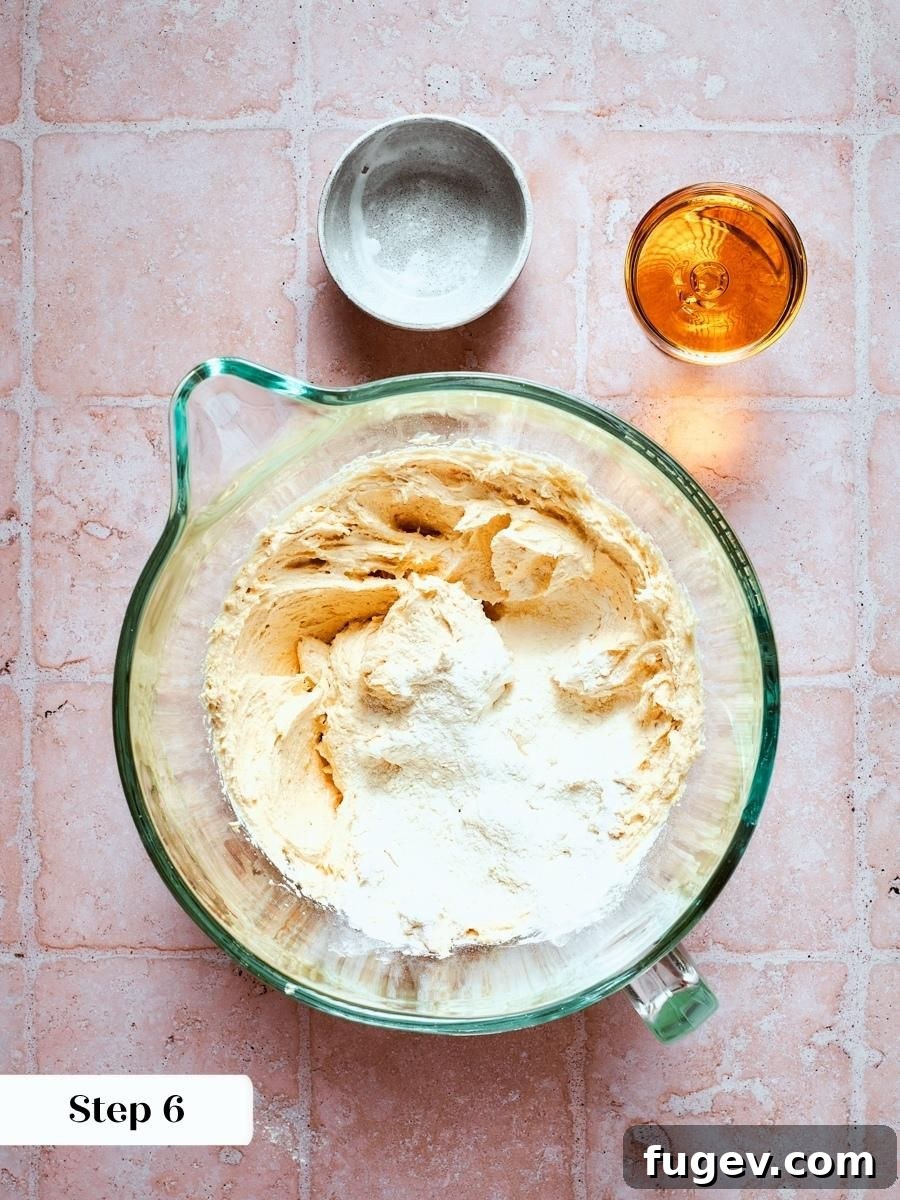 Classic French Apple Cake Recipe 6 Folding flour into the almond base gives french apple cake its sturdy yet tender crumb structure.