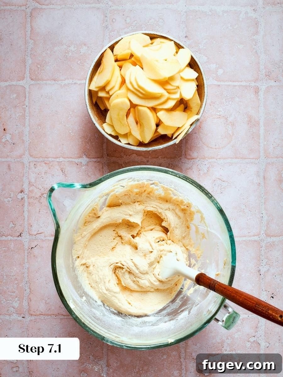 Classic French Apple Cake Recipe 7 Completed almond cream batter awaits the apple slices that will suspend throughout this french apple cake.